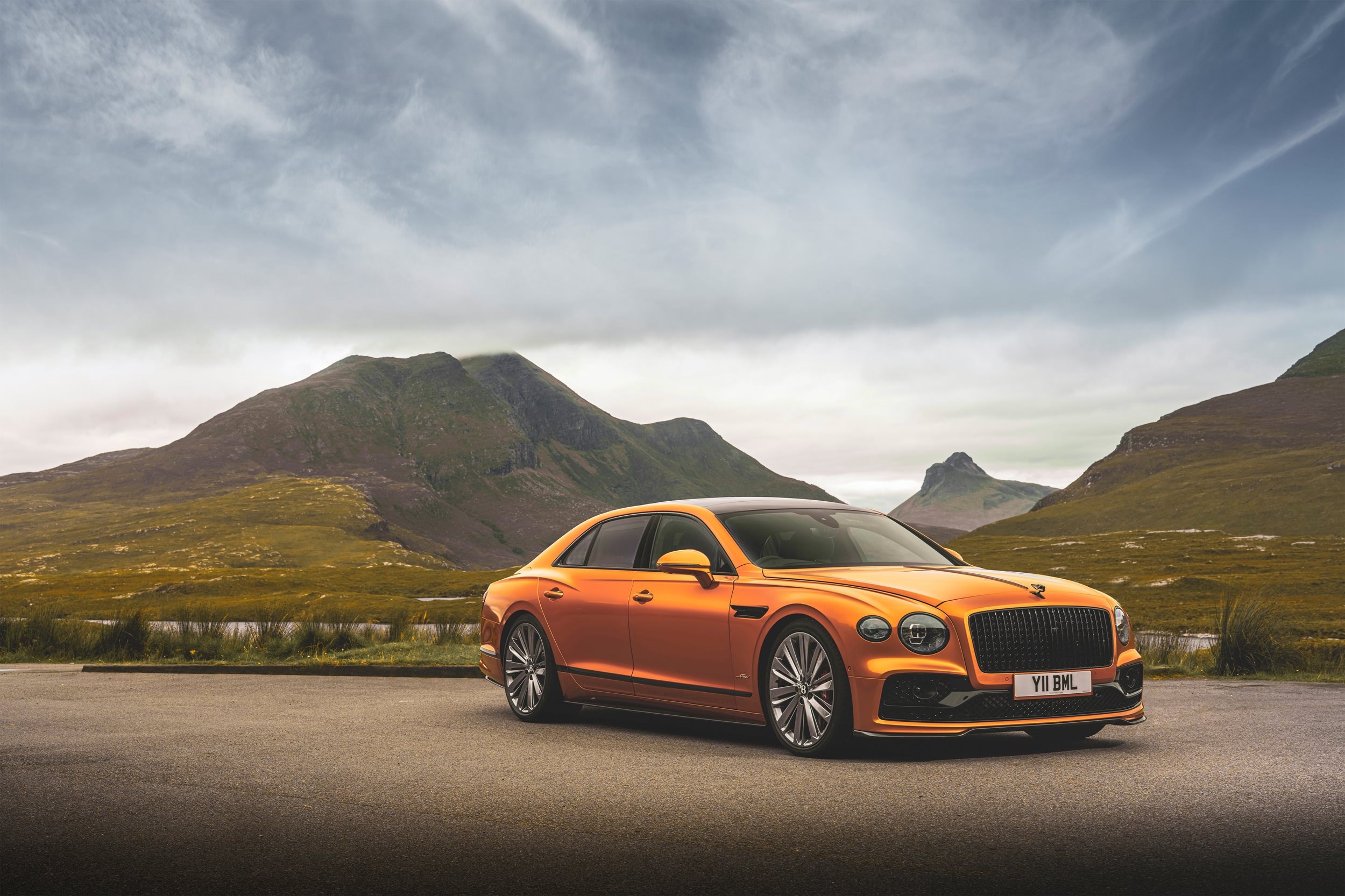 Colour , Orange Image type , Action Angle , Side/Profile Angle , Front 3/4 General , Performance General , Innovation General , Craftsmanship Corporate , Company Corporate , Beyond100 Current Models , Flying Spur , Flying Spur Speed Flying Spur Model Page Tag , Flying Spur Speed Model Page Tag 